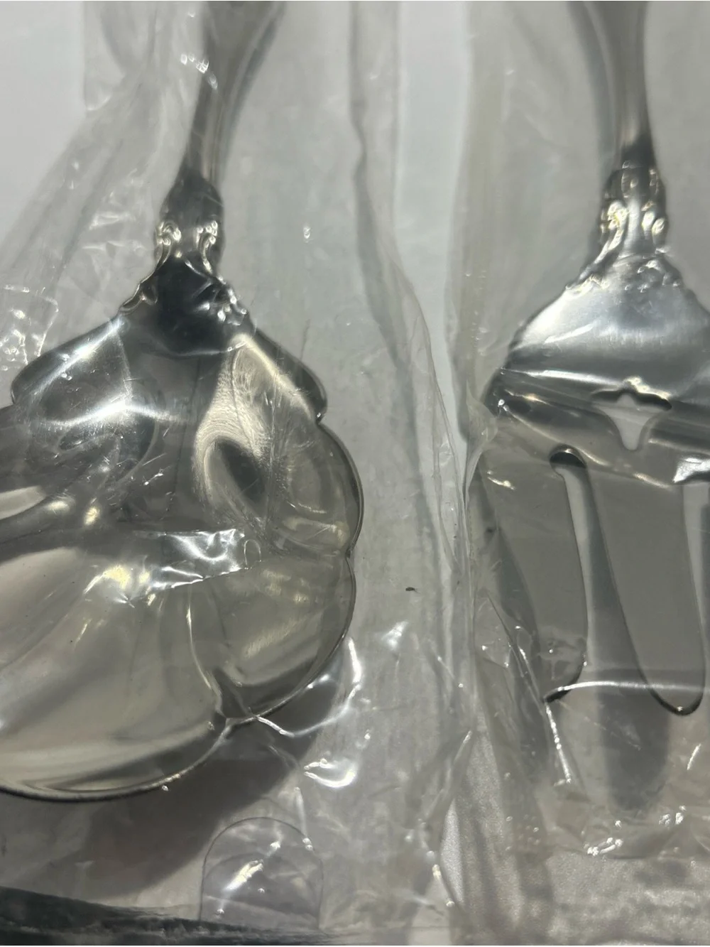 Oneida Silver Tone Decorative-Handle Serving Spoon and Fork Set